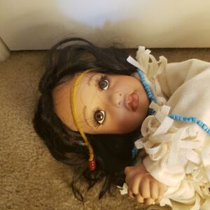 20" porcelain native American baby doll needs tlc